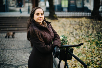 Portrait of the beautiful fashionable girl outdoor