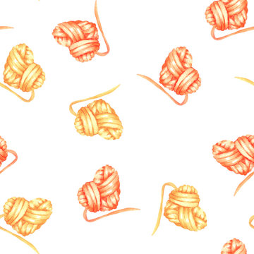 Seamless pattern with watercolor yellow and red heart ball of yarn; hand drawn on a white background