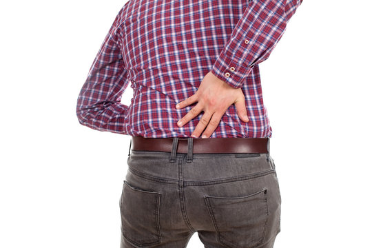Young man having backpain