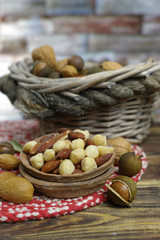 Roasted salted nuts mix, snack from macadamia, walnuts and almonds