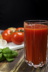 Raw Organic red Tomato Juice with salt, basil and bread