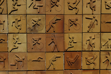 Sport icon set on earthenware brick wall. Sport pictogram