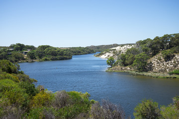 Fototapeta na wymiar A view of Moore river and its banks in Western Australia