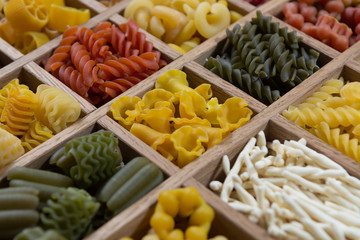 Variety of types, colors and shapes of Italian pasta. Dry pasta