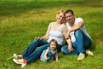 Fototapeta premium Happiness and harmony in family life. Happy family concept. Youn