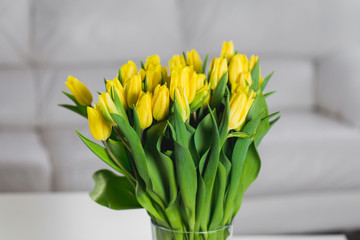 Bunch of yellow tulips at home