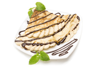 Crepes with bananas and cream