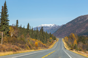 Driving on the road in  Kenai, colors of fall, Alaska, USA.