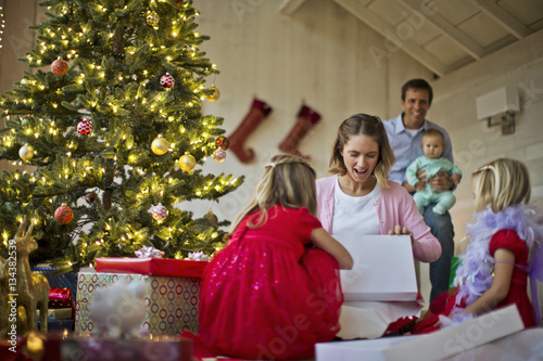 quot family unwrapping christmas gifts quot stock photo and quot family unwrapping christmas gifts quot stock photo and