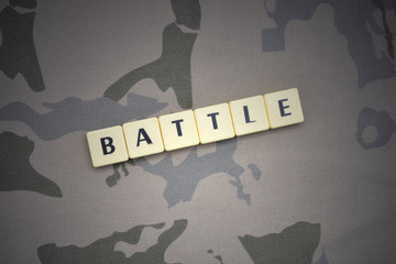 letters with text battle on the khaki background. military concept