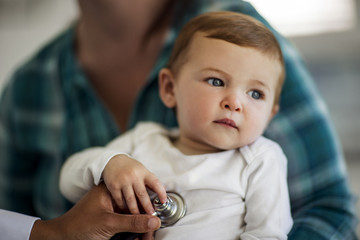 Baby boy having a medical check-up.