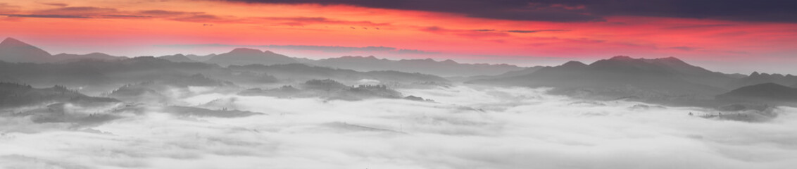 Obraz premium Foggy sunrise in the Carpathian mountains