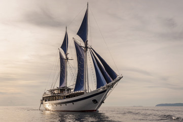 Traditional Indonesian Phinisi Schooner. These boats are made by hand and are designed to ply the waters of the Indonesian archipelago.  © LoweStock