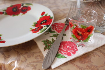 empty set for food, with painted red flowers