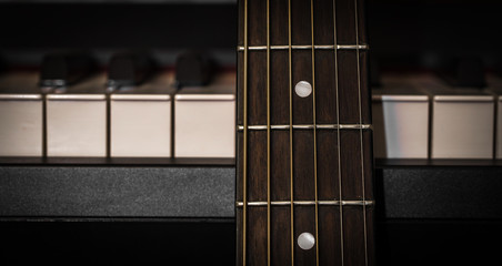 musical instruments piano keys and acoustic guitar © puhimec