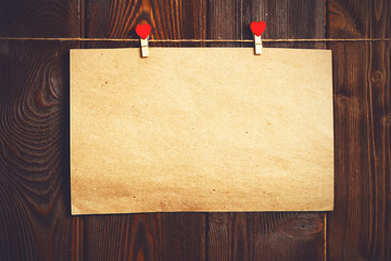 Card to day of St. Valentine. blank paper sheet and red heart on