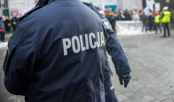 detail of a police (Policja) officer in Poland, demonstration in