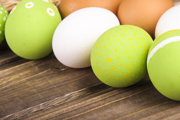 Obraz na płótnie Canvas Easter eggs on a dark wooden background