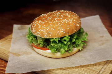yummy burger. serving cheeseburger or hamburger with salad and t