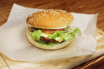 yummy burger. serving cheeseburger or hamburger with salad and t