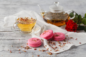 Breakfast with tea and three macaroons