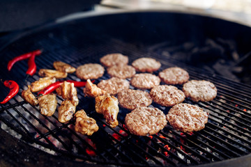 pork meat and chicken cutlets with pepper grilling for burgers.