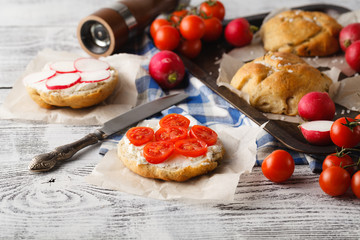 Breakfast with olive bread and tomato