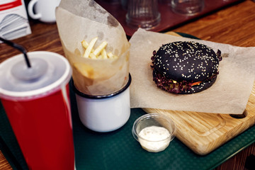 yummy burger. serving cheeseburger or hamburger with cola and fr