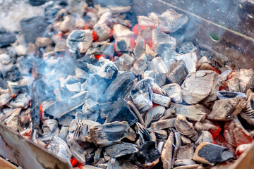 Coal fueled BBQ grill. It is too early to put the meat.