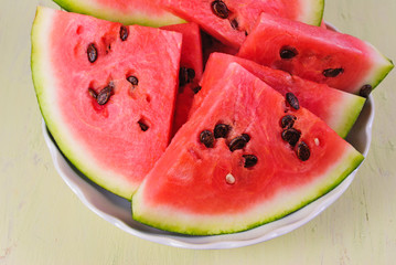 The pieces of cut watermelon red. Close-up