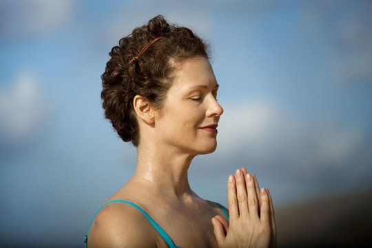 Close-up of woman practicing yoga 