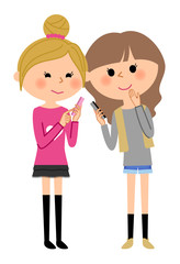 スマートフォンを見せ合うこども