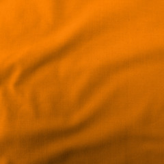 Textur Baumwolle / Stoff in Orange als Hintergrund