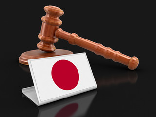 3d wooden mallet and Japanese flag. Image with clipping path