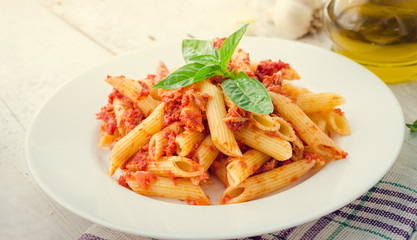 Penne pasta with tuna and basil