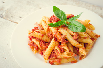 Penne pasta with tuna and basil