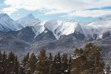 Naklejka na ściany i meble Winter mountains panorama with ski slopes. Caucasus.