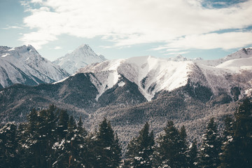 Fototapeta premium Winter mountains panorama with ski slopes. Caucasus.