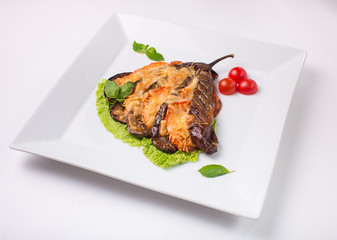 eggplant baked with cheese on white background