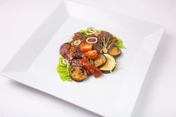 Baked meat with zucchini and eggplant