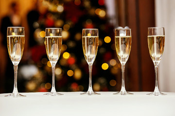 five glasses with a cool delicious champagne or white wine at the event catering © 9parusnikov