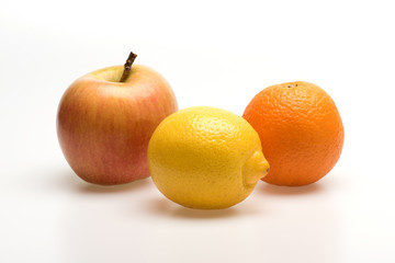 orange, lemon and apple fruit isolated on white