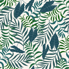 Tropical background with palm leaves. Seamless floral pattern