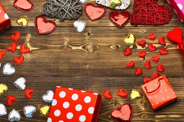 present package and heart on wood as valentines decoration