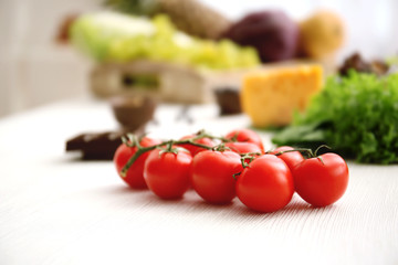 Cherry tomatoes on table