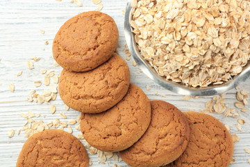 Diet cookies with oatmeal on white wooden background,top view