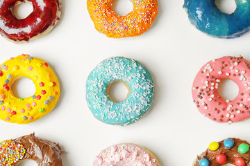 Glazed donuts on white background