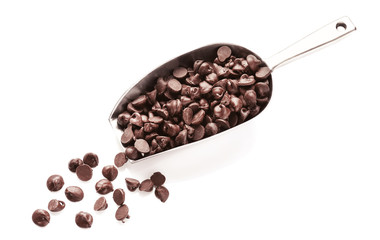 Metal scoop with tasty chocolate chips on white background
