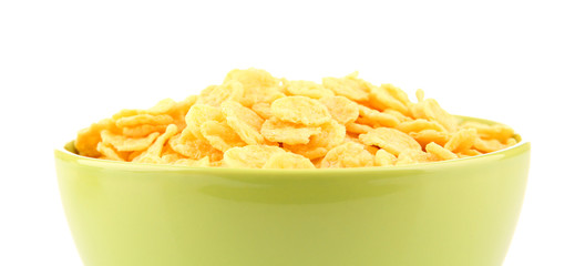 Bowl with cornflakes on white background