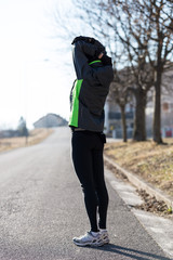 woman warming-up before her running